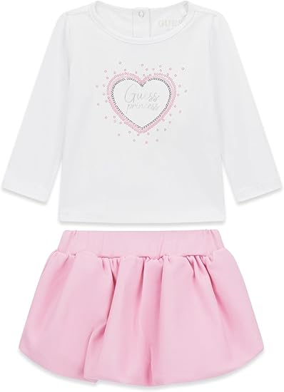 GUESS ENSEMBLE 2 PIÈCES : TEE-SHIRT BLANC MANCHES LONGUES AVEC INSCRIPTION ARGENTÉE ET STRASS, PETITE JUPE ROSE AVEC CULOTTE INTÉGRÉE