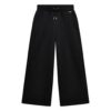 Pantaloni sportivi a gamba larga da bambina di colore nero con lacci e logo Guess metallico